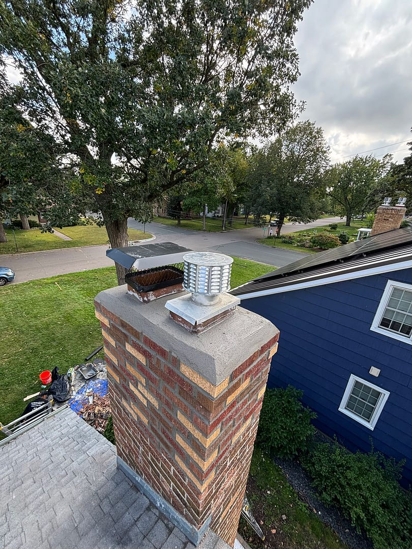 Professional chimney services in Anoka County MN Local chimney sweep cleaning a fireplace in Anoka Minnesota Chimney repair and masonry restoration in Anoka County MN Chimney cap and liner installation service in Anoka MN